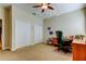 Office featuring a desk, shelving unit and a comfortable chair at 757 Date Palm Lane, St Petersburg, FL 33707