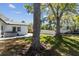 Spacious backyard with patio and canal views with boat dock at 8704 Thornwood Ln, Tampa, FL 33615
