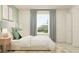 Cozy bedroom featuring a plush bed, large window, and coordinating decor at 9308 Cannon Beach Dr, Parrish, FL 34219