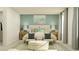 Serene main bedroom with a calming color palette, stylish furniture, and ample natural light at 9308 Cannon Beach Dr, Parrish, FL 34219