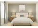 Cozy bedroom featuring a queen-sized bed with a stylish headboard and soft linens at 9324 Bonita Mar Dr, Parrish, FL 34219