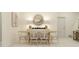 Elegant dining area with a modern table setting and stylish decor accents at 9324 Bonita Mar Dr, Parrish, FL 34219