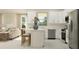 Bright kitchen featuring stainless steel appliances, an island with seating, and white cabinets at 9324 Bonita Mar Dr, Parrish, FL 34219