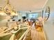 View of the living room and dining area, showcasing an open layout perfect for modern living and entertaining at 1 Boca Ciega Point Blvd # 213, St Petersburg, FL 33708