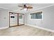 Bedroom featuring ceiling fan, window and a mirrored closet, providing ample space at 101 30Th N Ave, St Petersburg, FL 33704