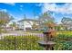 Beautiful exterior view of a house with a fountain, manicured landscaping and a fence at 101 30Th N Ave, St Petersburg, FL 33704