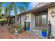 Charming home exterior with double doors, manicured landscaping, and brick patio at 101 30Th N Ave, St Petersburg, FL 33704