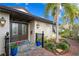 Inviting front entrance with double doors, brick accents, and beautiful landscaping at 101 30Th N Ave, St Petersburg, FL 33704