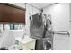 Modern laundry room featuring a stacked washer and dryer and utility sink at 101 30Th N Ave, St Petersburg, FL 33704