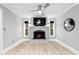 Inviting living room showcases a fireplace, mounted TV, and neutral tones at 101 30Th N Ave, St Petersburg, FL 33704