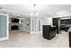 Open floor plan with modern kitchen, dining area and a cozy living room with fireplace at 101 30Th N Ave, St Petersburg, FL 33704