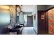 Unique bathroom with eye-catching wall decor, modern light fixtures and double sink with black hardware at 10787 Oak Ne St, St Petersburg, FL 33716