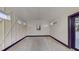 Living room with an interesting wainscoting pattern and minimalist design at 10787 Oak Ne St, St Petersburg, FL 33716