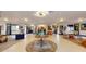 Bright and airy lobby with stylish furnishings, artistic decor, and an open, welcoming atmosphere at 10787 Oak Ne St, St Petersburg, FL 33716