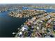 Aerial image displays a coastal community with waterfront homes and a picturesque view of the harbor at 1100 Cordova Ne Blvd, St Petersburg, FL 33704