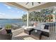 A covered balcony with patio furniture provides gorgeous views of the bay at 1100 Cordova Ne Blvd, St Petersburg, FL 33704