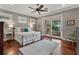 This bedroom boasts hardwood floors, natural light, and a sliding glass door that opens to an outdoor living space at 1100 Cordova Ne Blvd, St Petersburg, FL 33704