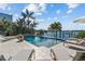 Poolside with a beautiful bay view with dock at 1100 Cordova Ne Blvd, St Petersburg, FL 33704
