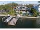 Home with a dock, pool, and patio area, offering a luxurious waterfront lifestyle at 1100 Cordova Ne Blvd, St Petersburg, FL 33704