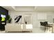 Open living space featuring modern furniture, sleek decor, and seamless flow to the kitchen at 11749 E 74Th Cir, Palmetto, FL 34221