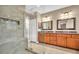Bathroom featuring a double vanity and walk-in shower at 1259 Ribolla Dr, Palm Harbor, FL 34683