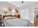 Bedroom featuring hardwood floors, a ceiling fan, and closet at 1259 Ribolla Dr, Palm Harbor, FL 34683