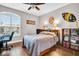 Cozy bedroom with hardwood floors and a large window at 1259 Ribolla Dr, Palm Harbor, FL 34683