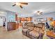 Spacious living room with a view of the open kitchen and comfortable seating at 1259 Ribolla Dr, Palm Harbor, FL 34683