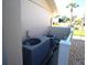 Exterior view of the home's two air conditioning units on a gravel base at 130 Water Oak Way, Oldsmar, FL 34677