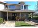 Beautiful two-story home with a welcoming front porch and manicured lawn at 130 Water Oak Way, Oldsmar, FL 34677