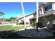 Charming home with a well-manicured lawn and beautiful landscaping at 130 Water Oak Way, Oldsmar, FL 34677