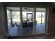 Lanai with outdoor seating overlooking water view, perfect for relaxation and enjoying nature's beauty at 130 Water Oak Way, Oldsmar, FL 34677
