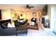 Spacious living room with modern décor, fireplace and open-concept design at 130 Water Oak Way, Oldsmar, FL 34677