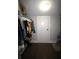 Functional walk-in closet with wood floors, clothing racks, and overhead lighting at 130 Water Oak Way, Oldsmar, FL 34677