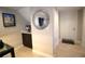 Stylish wet bar with decorative mirror and sleek cabinetry creates an inviting space for entertaining at 130 Water Oak Way, Oldsmar, FL 34677