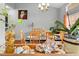Dining room with a glass table and views of the backyard at 13542 Summerwood Ct, Hudson, FL 34667