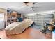 Spacious garage with covered car, shelving and ample storage space at 13542 Summerwood Ct, Hudson, FL 34667