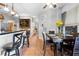 Open-concept kitchen with breakfast bar and easy access to living room and outdoor views at 13542 Summerwood Ct, Hudson, FL 34667