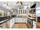 Well-equipped kitchen with modern appliances, sleek countertops, and ample storage space at 13542 Summerwood Ct, Hudson, FL 34667