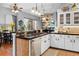 Beautiful kitchen features granite countertops, stainless steel appliances, and ample cabinet space at 13542 Summerwood Ct, Hudson, FL 34667