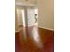 Bedroom featuring hardwood floors and a doorway to the kitchen and walk-in closet at 1914 E 4Th Ave # 2, Tampa, FL 33605