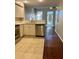 Well-equipped kitchen featuring stainless steel appliances and white cabinetry with a tile floor at 1914 E 4Th Ave # 2, Tampa, FL 33605
