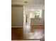 An open concept living room featuring hardwood floors that connects to the kitchen at 1914 E 4Th Ave # 2, Tampa, FL 33605