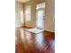 Bright living room featuring hardwood floors, lots of natural light, and a back patio at 1914 E 4Th Ave # 2, Tampa, FL 33605