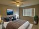 Comfortable bedroom offers natural light, fan, and soft textures, creating a tranquil space at 204 Pine Tulip Ct # 102, Tampa, FL 33612