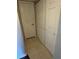 Hallway shows multiple closets for maximum storage at 204 Pine Tulip Ct # 102, Tampa, FL 33612