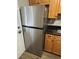 Stainless steel refrigerator with a top freezer and bottom refrigerator section at 204 Pine Tulip Ct # 102, Tampa, FL 33612