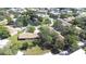 An aerial view of community layout showcasing ponds, green spaces, and multiple units at 2201 Pine Dr, Tarpon Springs, FL 34689