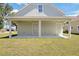 Backyard with a covered patio at 25 W Edwards St, Plant City, FL 33563