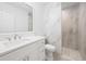 Modern bathroom with tiled walk-in shower and matching vanity at 25 W Edwards St, Plant City, FL 33563
